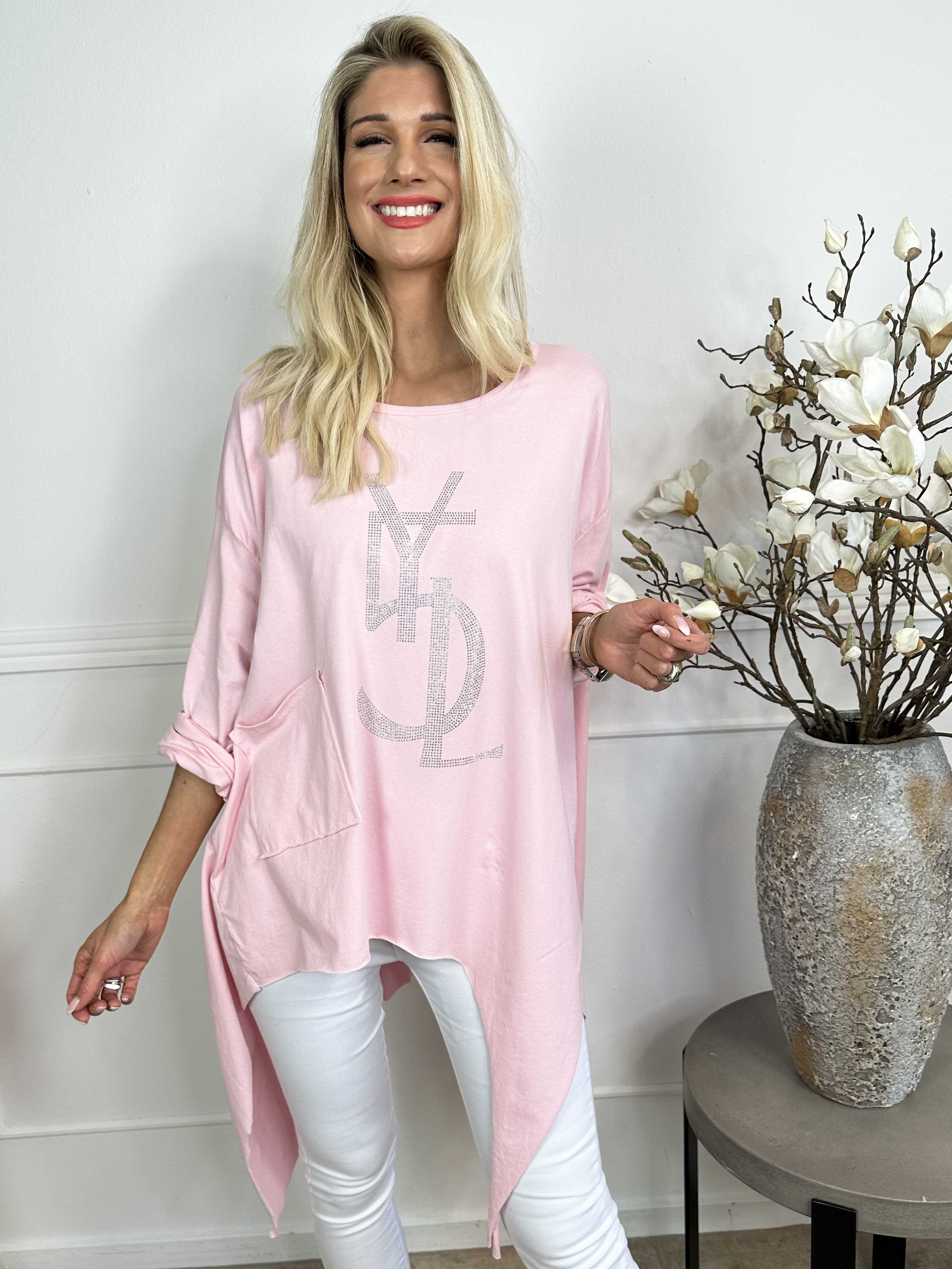 Daniella - Bluse med forskellige snit og similisten på brystet